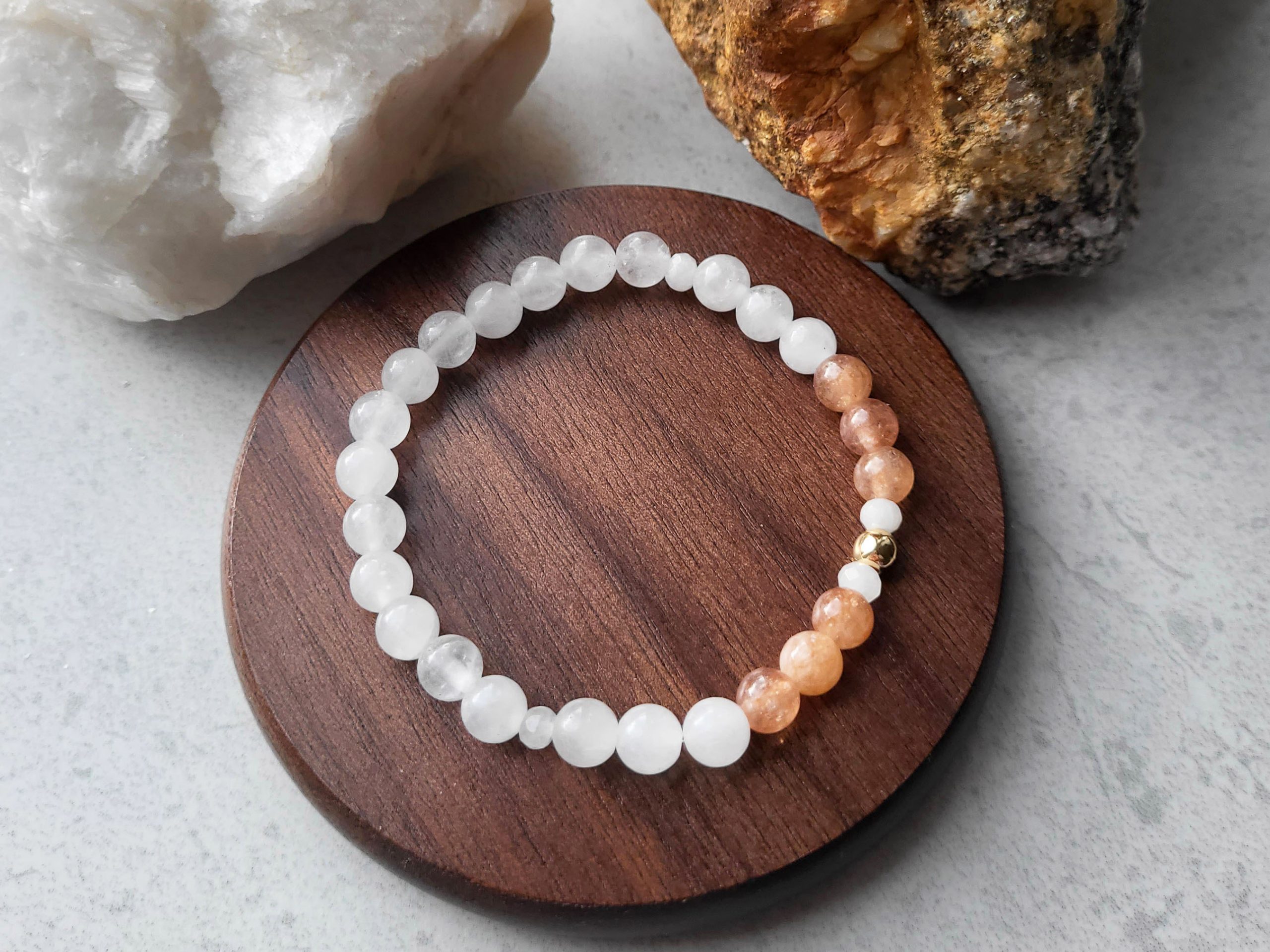 Jewelry with a variety of beads: sunstone, white jade, and gold-filled